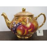 A tea pot, decorated with hand painted fruit signed N Creed