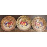 A cabinet plate, decorated with hand painted fruit signed N Creed, diameter 8.5ins, together with