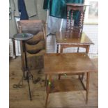 Three various tables, a metal plant stand and a magazine rack