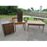 A pine kitchen table together with a side table, oak chest of Drawers and a pot cupboard