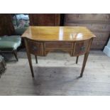 A 19th century break front side board, or dressing table, fitted with drawers, with cross banded