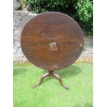 A 19th century mahogany tilt top tripod table diameter 32ins