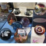 8 Caithness glass paperweights, together with a Jonathan Harris glass paperweight