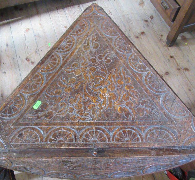 A circular carved drop flap table, diameter 28ins, together with a carved milking chair and a carved - Image 2 of 2