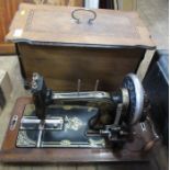 A boxed vintage sewing machine