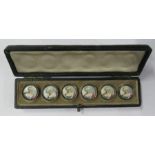 Set of six 19th century buttons, each painted portrait of lady, in fitted case