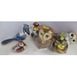 Seven Royal Crown Derby paper weights including owls, ducks etc