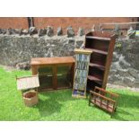 A set of shelves, CD rack and contents, cabinet, magazine rack, and novelty well