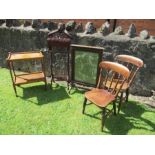 A collection of furniture to include a pair of chairs, fire screen frame, tea trolley , clothes
