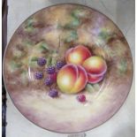 A Royal Worcester plate, decorated with fruit to a mossy background by J Smith, diameter 10.5ins - -