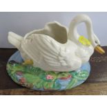A Clarice Cliff centre pieces, formed as a swan