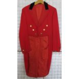 A military red mess tail coat, with green velvet collar, the gilt buttons marked Royal Military