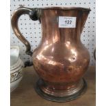 An Antique copper jug