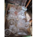 A box of glassware including decanters