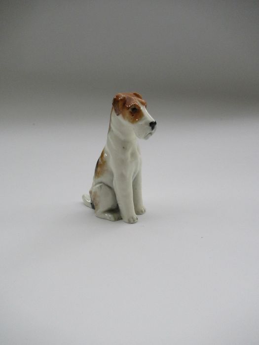 A Royal Worcester model, of a seated Fox Terrier, Shape No 2942, height 2.4ins