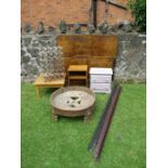 A collection of furniture to include a walnut bed end, occasional table, wine rack, circular planter