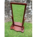 A 19th century mahogany framed cheval mirror with beveled plate, total height 39ins, total width