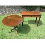 An antique oak tripod table diameter 29.5ins, height 26.5ins, together with a mahogany side table
