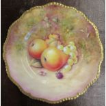 A Royal Worcester cabinet plate, decorated with fruit to a mossy background by J Reed, diameter 8ins