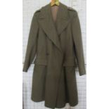 A Unikit green army issue wool great coat, with embroidered military badges to the epilates