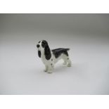 A Royal Worcester model, of a Spaniel, Shape No 3033, height 2.75ins