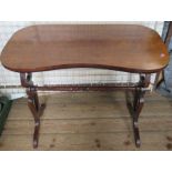 A mahogany kidney shaped table, width 32ins, height 28.75ins