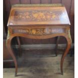 A 19th century French Kingwood and marquetry desk, with floral inlay and gilt metal mounts, the fall