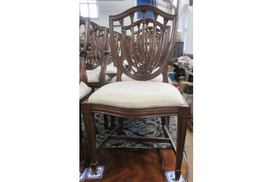 A set of 12 (10+2) reproduction mahogany dining chairs with carved decoration  - no fire lables - Image 3 of 3