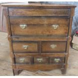 A small Antique oak chest of drawers, 26ins x 13.25ins, height 31.75ins