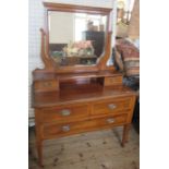 An Edwardian mahogany and satinwood inlaid dressing chest, width 42ins