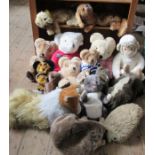 A collection of Vintage teddy bears and pyjama cases, to include a Dean's musical bear,