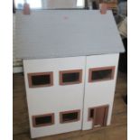 A painted wooden dolls house, height 36ins, width 26.5ins, depth 20ins