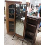 A small oak double corner cupboard, height 60ins, together with a chavel mirror and a bookcase,