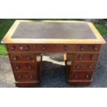 A 19th century mahogany pedestal desk, fitted nine drawers around the kneehole, height 29ins,