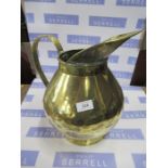 An Antique style brass jug