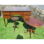 An Edwardian mahogany five drawer writing table, with leather inset top, having satinwood inlay,