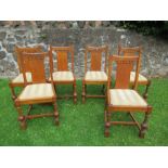 A set of six oak dining chairs, in the Art Deco style