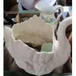 A box of china to include swan, wash jug, mugs etc