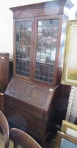 An oak bureau bookcase, width 30ins, height 79ins