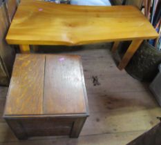 A coffee table, together with a coal box, green metal box, pictures and mirrors