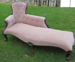 A 19th century rosewood framed chaise longue, with carved decoration