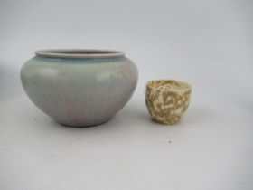 A Ruskin pottery high fired vase, decorated with a mauve, gray blue ground af, height 3.5ins,