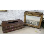 A cased set of books, the leather covered box with glazed print to the hinged door, together with