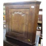 An Antique oak corner cupboard, width 26.5ins, height 26ins, depth 14.5ins