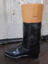 A china stirrup cup, formed as a hunting boot