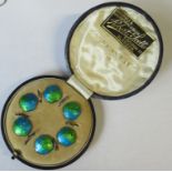 A set of six sterling silver and enamel buttons, in a fitted case marked Queensway Art Enamel