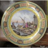 A Meissen cabinet shallow dish, decorated with figures in a harbor, diameter 11.5ins