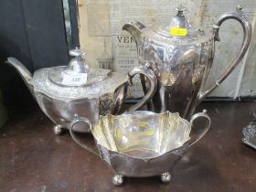 A silver plate three piece tea set