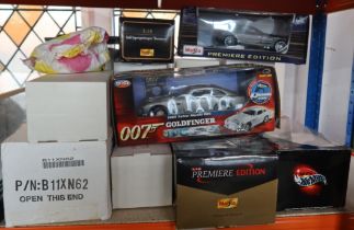 A collection of boxed car models (16)