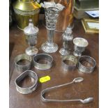 A collection of hallmarked silver, to include napkin rings, condiments etc